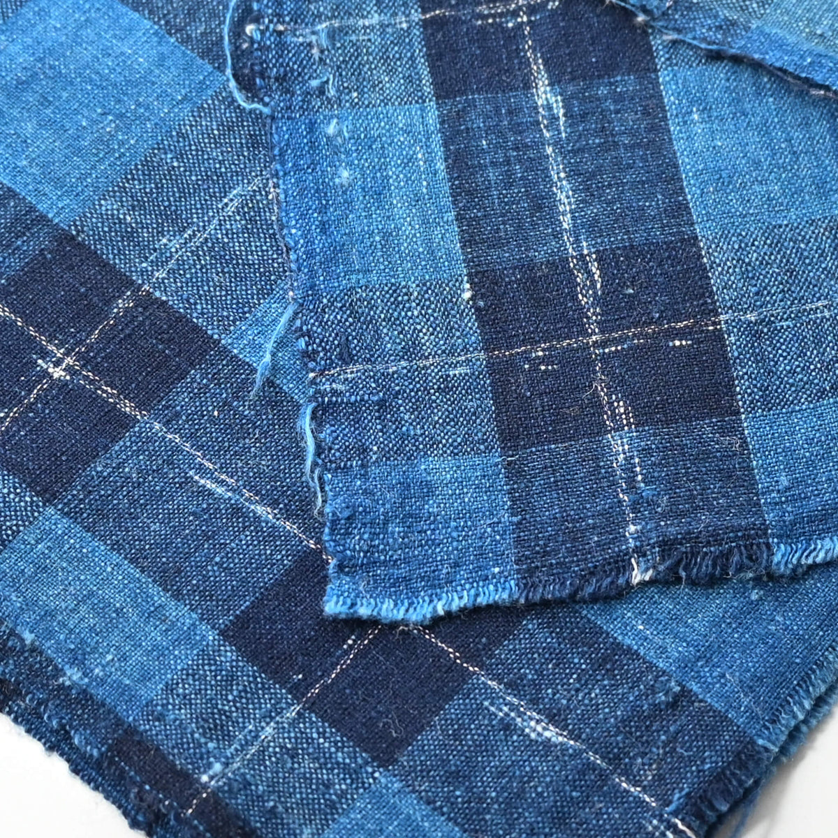 Close-up view of vintage Japanese indigo check cotton from a futon cover.