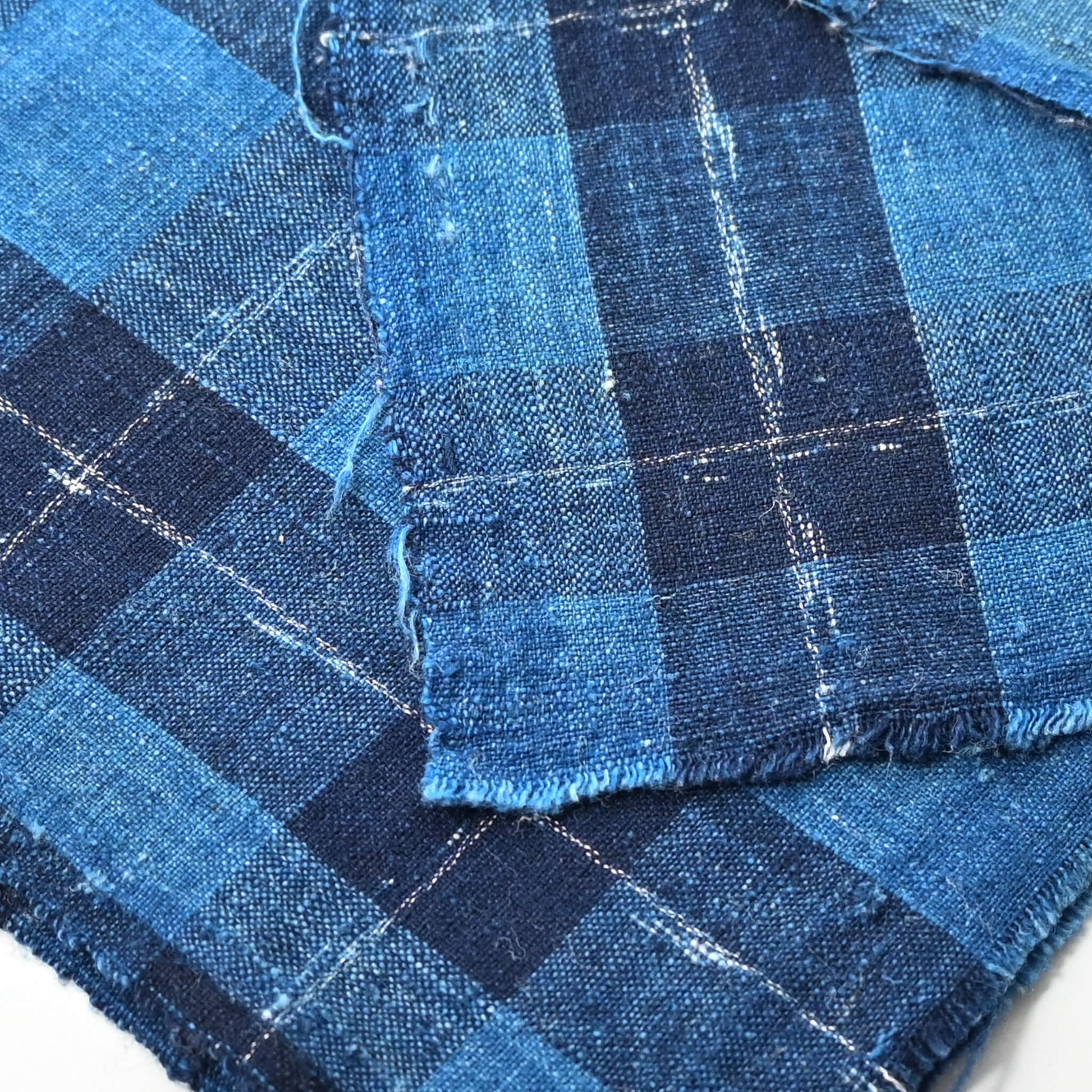Close-up view of vintage Japanese indigo check cotton from a futon cover.