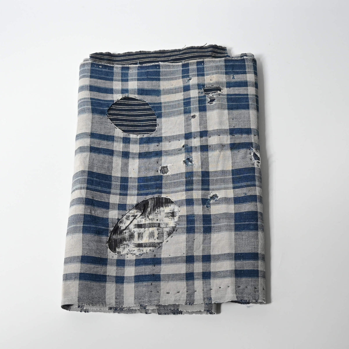 Vintage Japanese indigo check cotton fabric from an old futon cover.