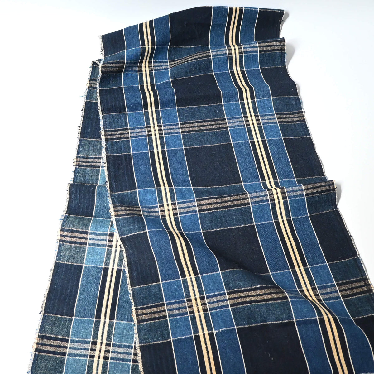 Full view of vintage Japanese indigo check cotton piece from a futon cover, mid-20th century.