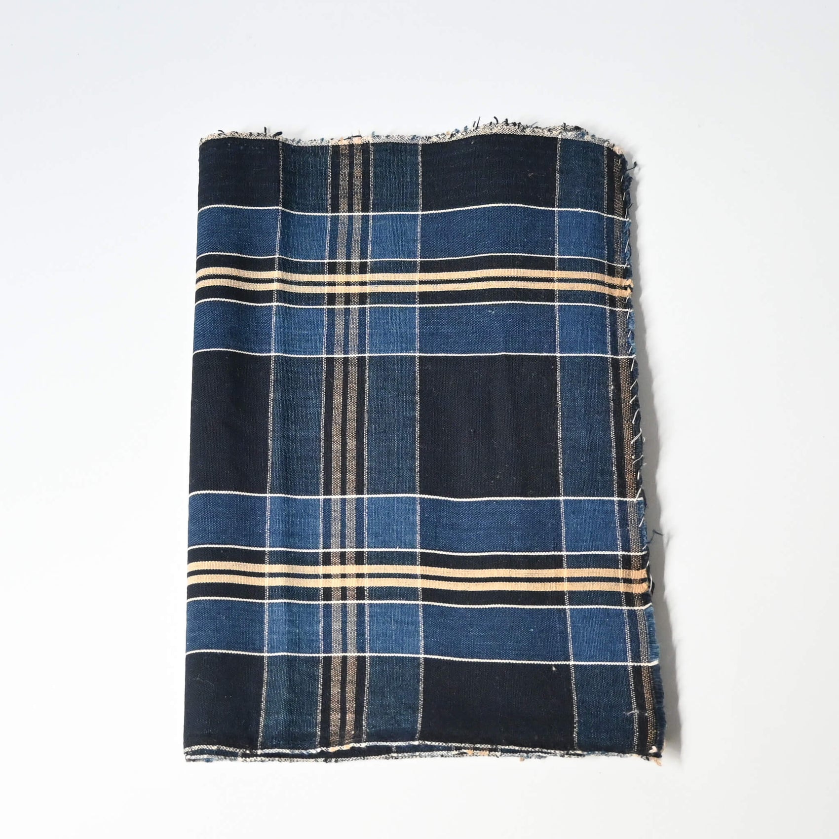 Vintage Japanese indigo check cotton piece from a futon cover, mid-20th century.