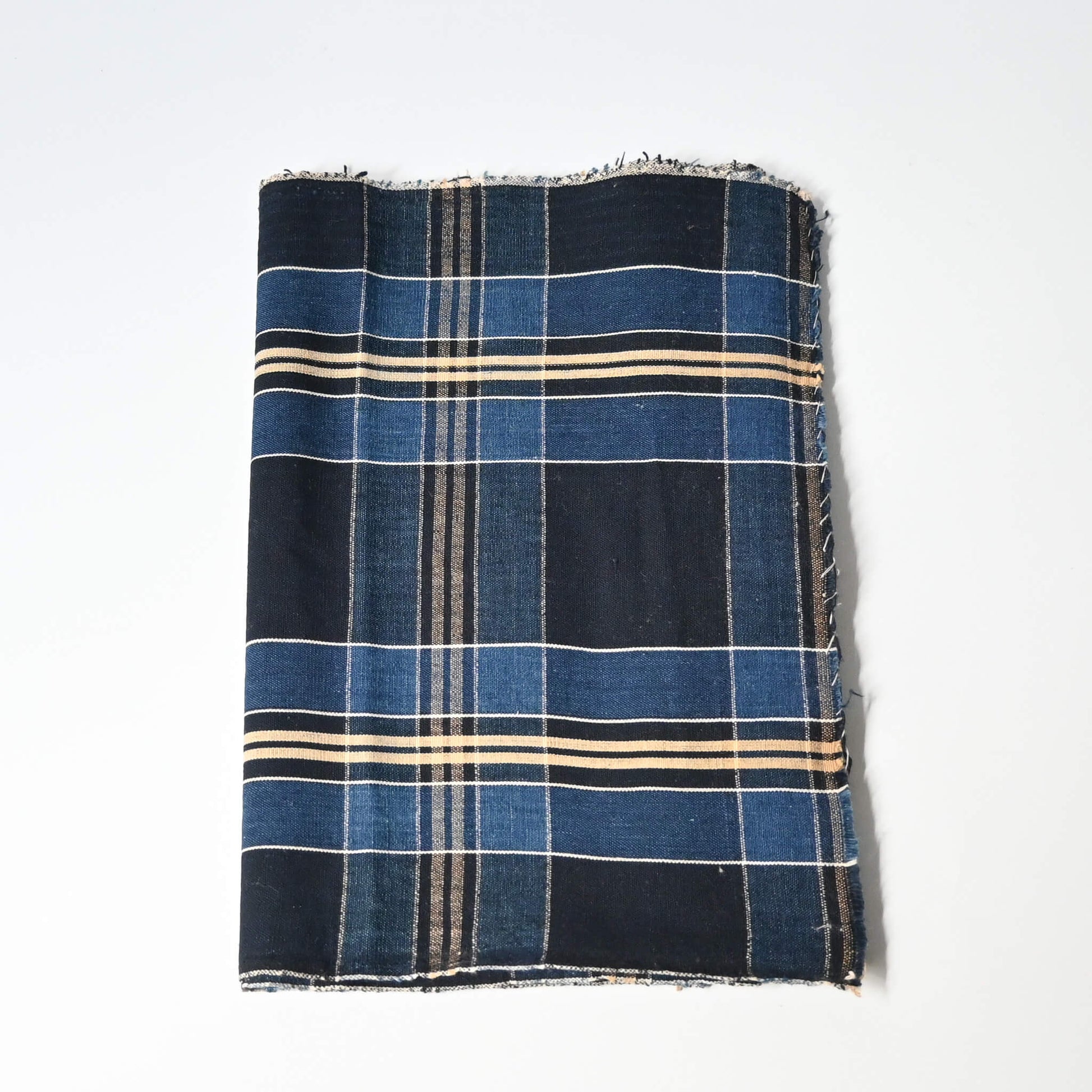 Vintage Japanese indigo check cotton piece from a futon cover, mid-20th century.
