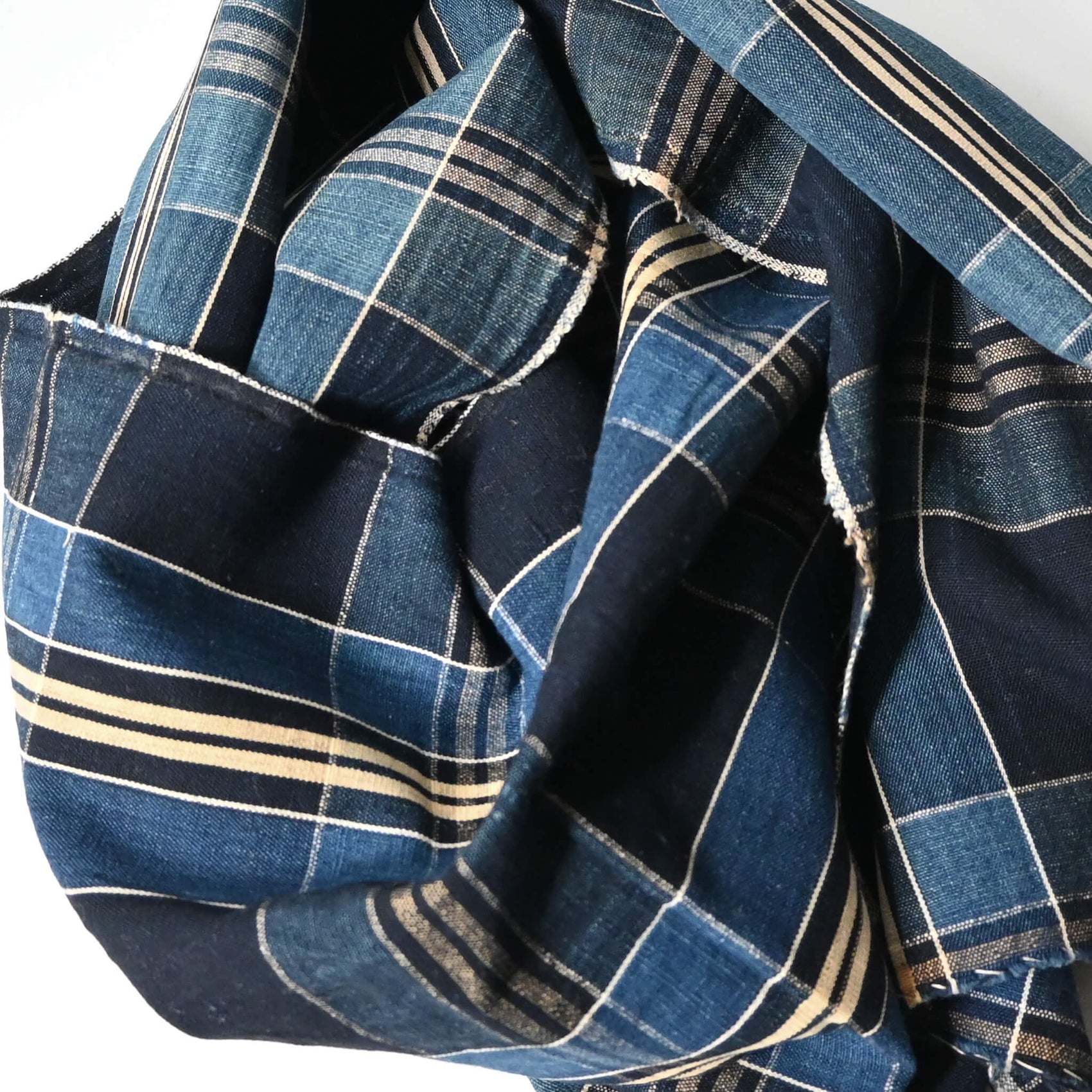 Close-up view of vintage Japanese indigo check cotton piece from a futon cover, mid-20th century.