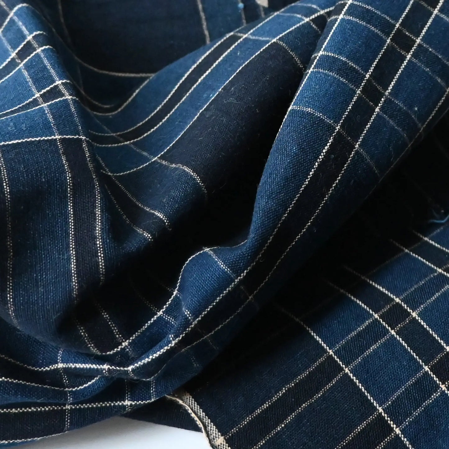 Detailed view of vintage Japanese indigo check cotton from a  futon cover.