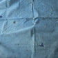 Vintage Japanese indigo cotton furoshiki with various hand-stitched mends, family crest and surname are dyed at corners.