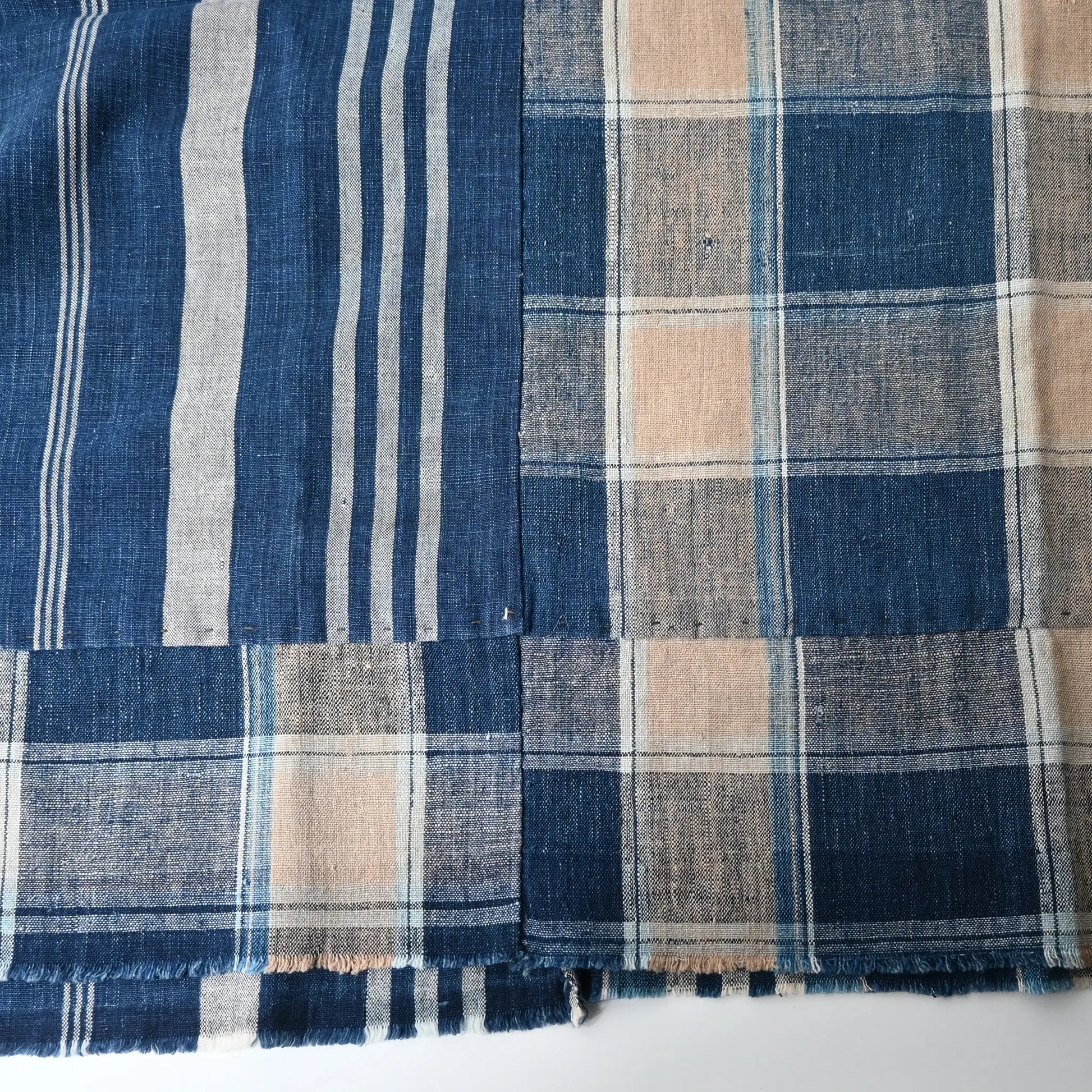 Detailed view of Vintage Japanese indigo futon cover with check and stripe from mid-20th century.