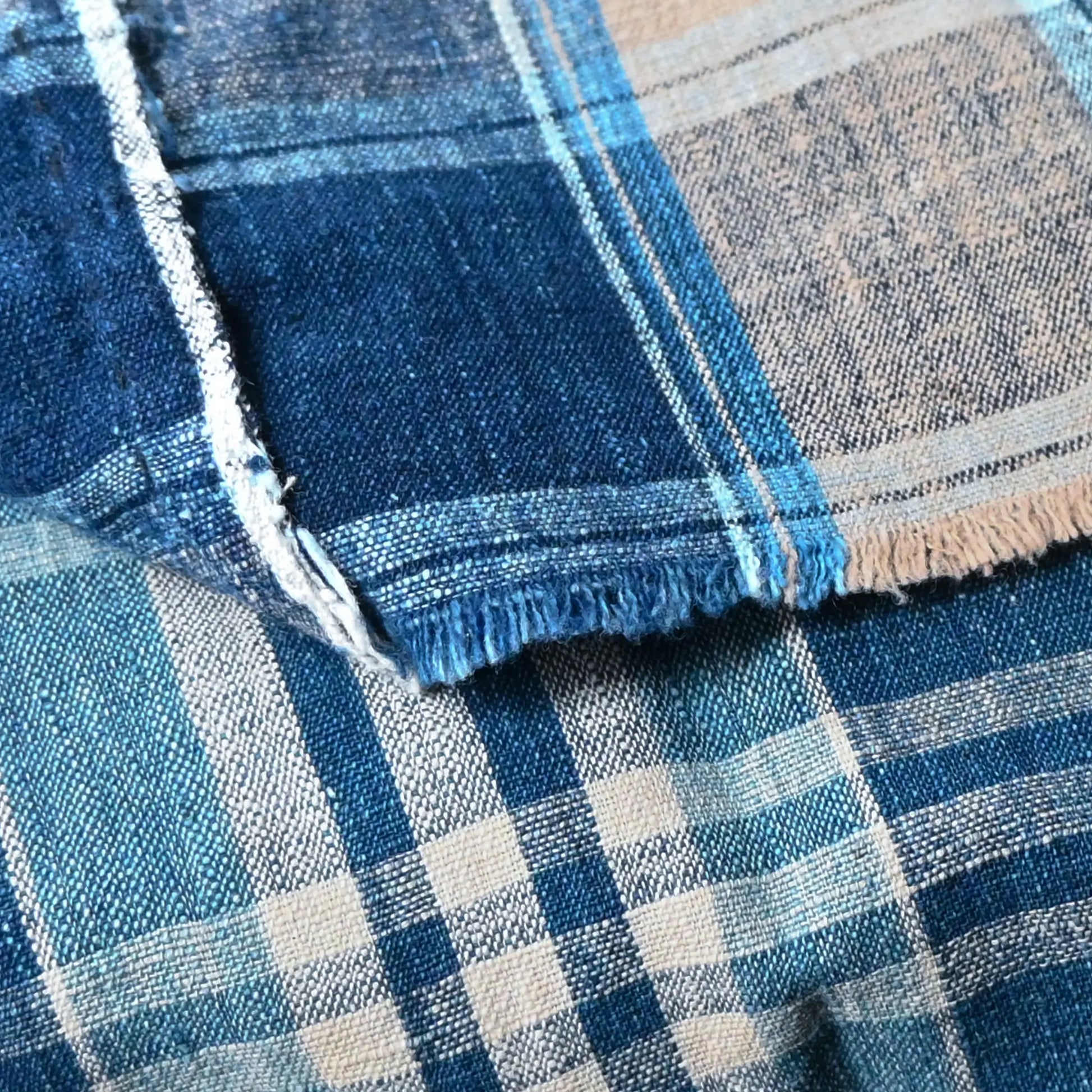 Detailed view of Vintage Japanese indigo futon cover with check and stripe from mid-20th century.