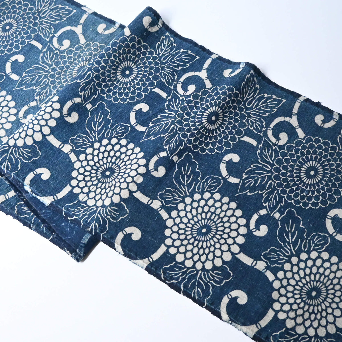 Vintage Japanese indigo Katazome dyed cotton with chrysanthemum karakusa motif from the early 20th C.