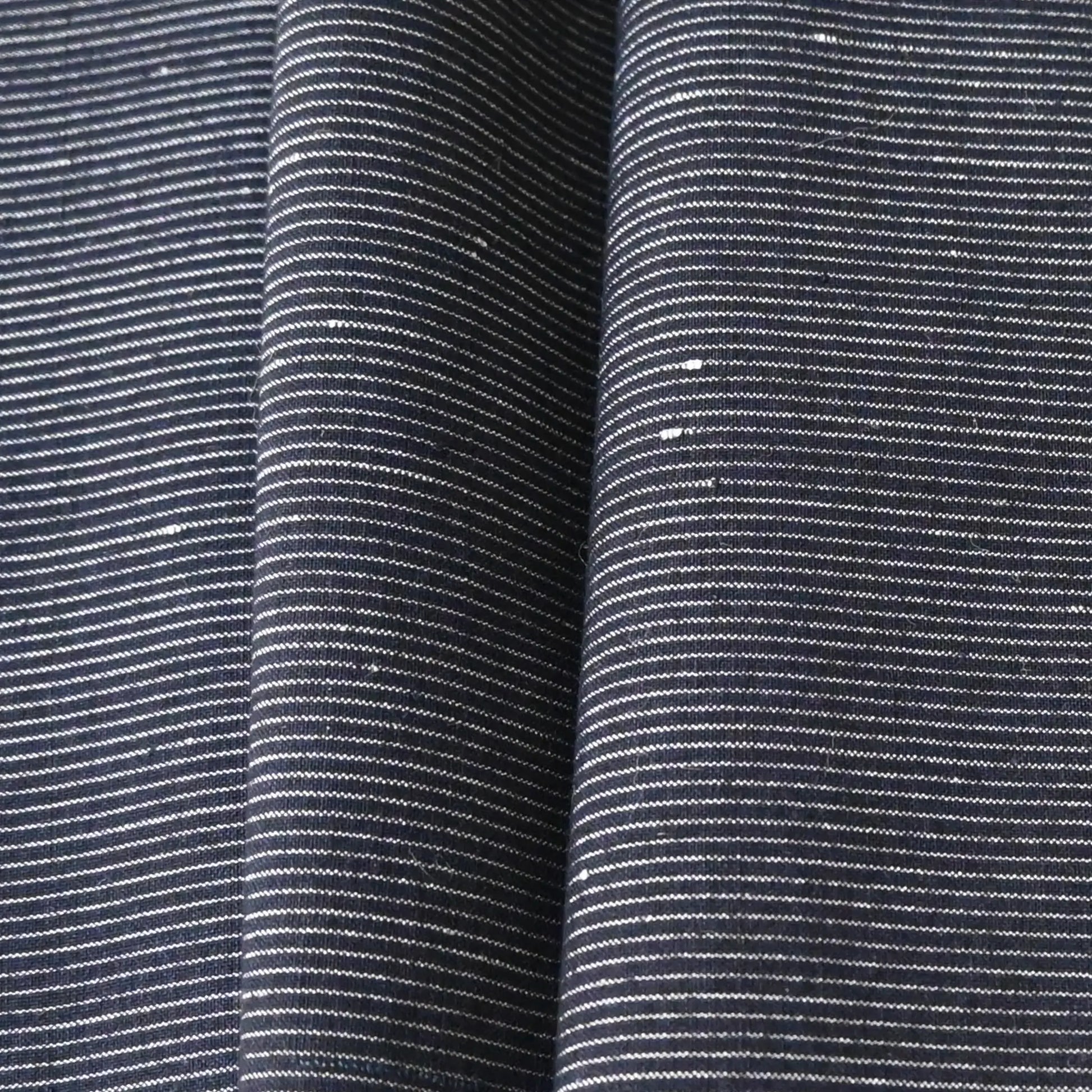 Close-up view of vintage Japanese indigo pinstripe cotton from the mid-20th century.