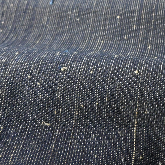 Detailed view of vintage Japanese indigo pinstripe cotton with beautiful texture.