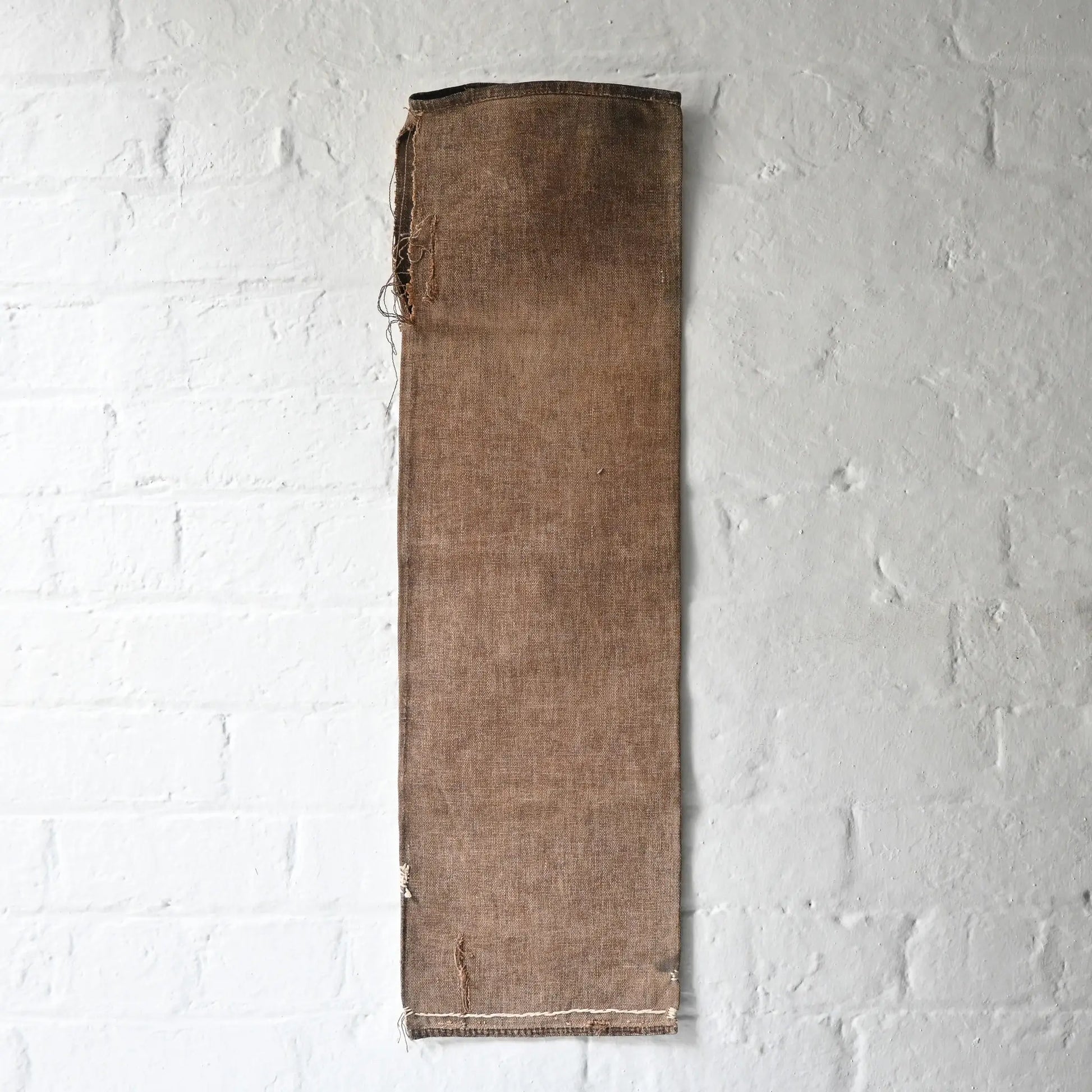 Full view of vintage heavy cotton sake bag called Sakabukuro, dyed with kakishibu fermented persimmon juice.