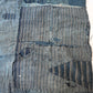 Vintage old indigo strip cotton with hand stitched mends.
