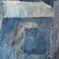 Indigo Boro rag with repeated mending.