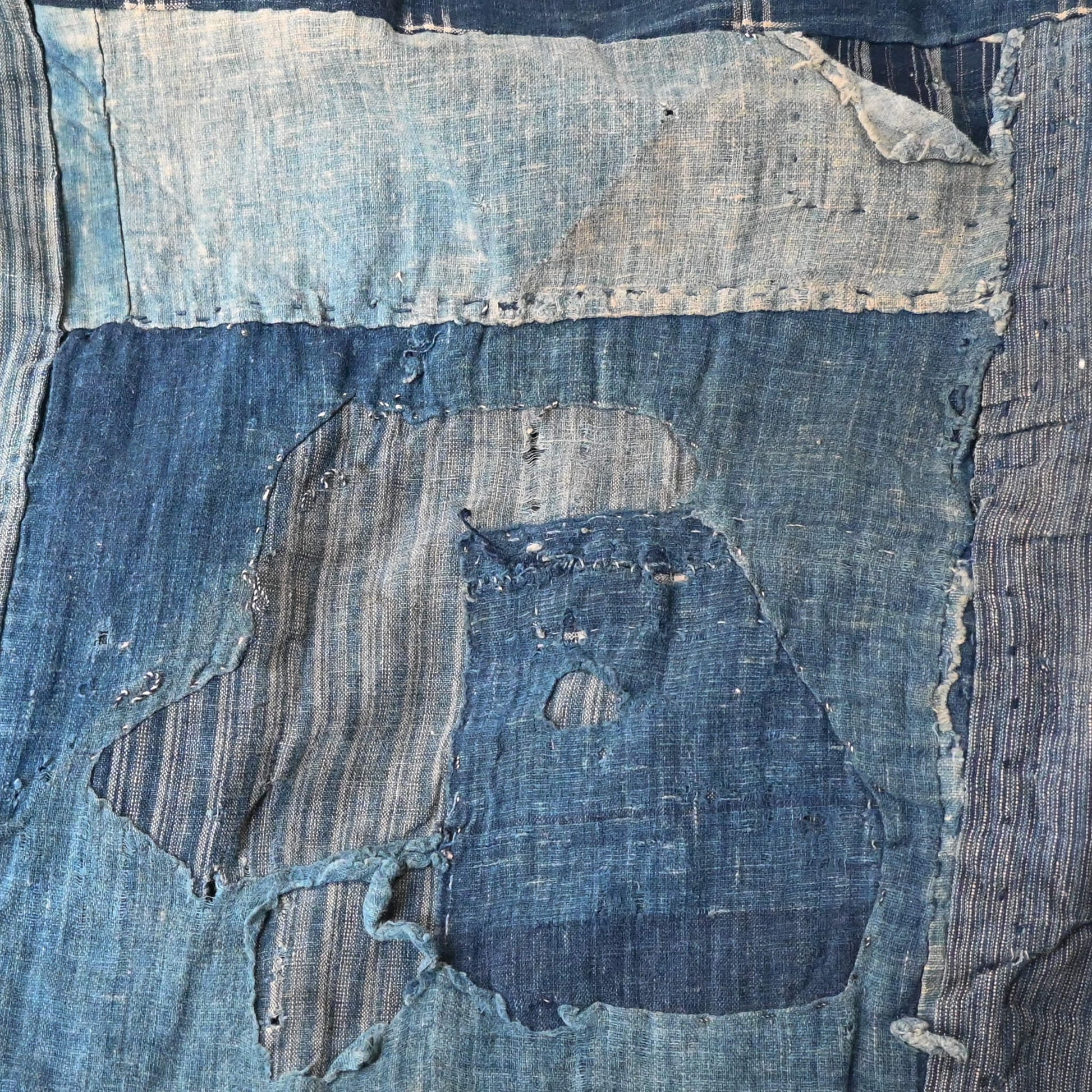 Indigo Boro rag with repeated mending.