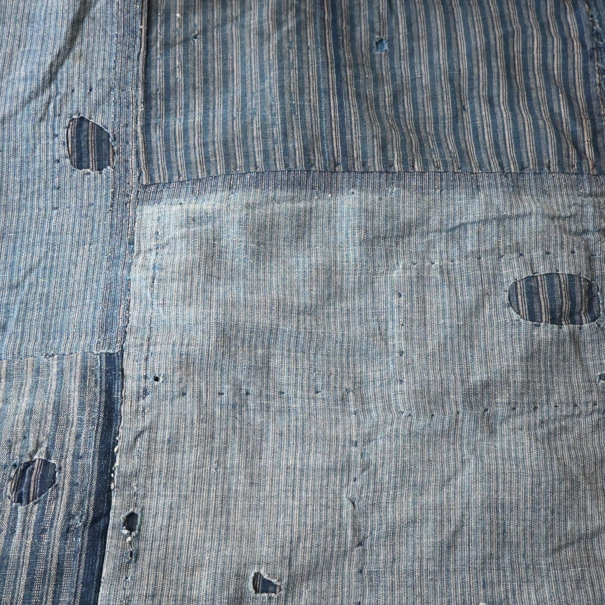 Vintage indigo stripe cotton with some lovely mends, hand stitched.