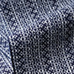 Close-up view of vintage traditional Japanese men's cotton yukata fabric with geometric pattern.