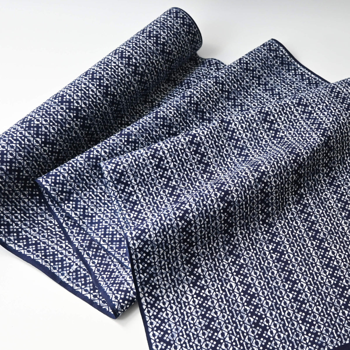 Full view of vintage traditional Japanese men's cotton yukata fabric with geometric pattern.