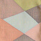 Detailed view of vintage Japanese women's fukuro obi, striking geometric multicoloured pattern. 
