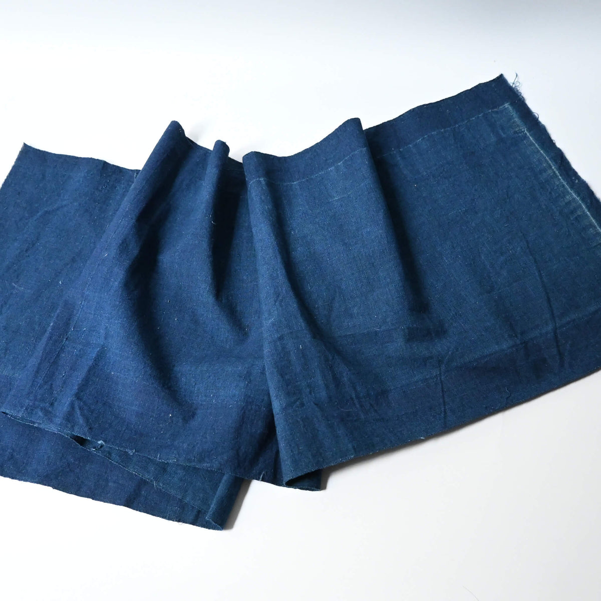 Full view of vintage Japanese plain indigo cotton from undone kimono.
