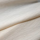 Detailed view of vintage Japanese plain silk jacquard kimono roll with grass motif.