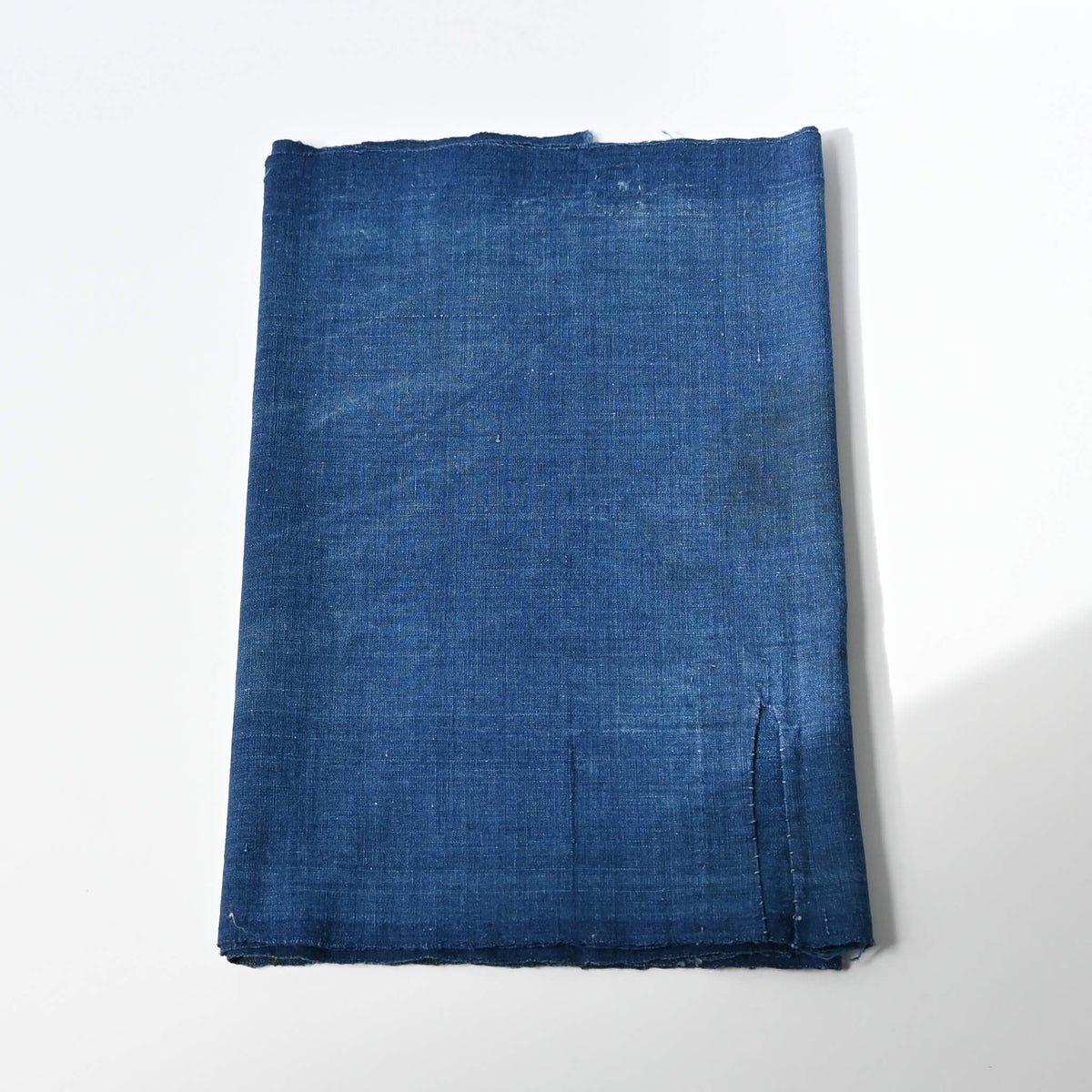 Vintage Japanese plain indigo cotton from old kimono with some mends.