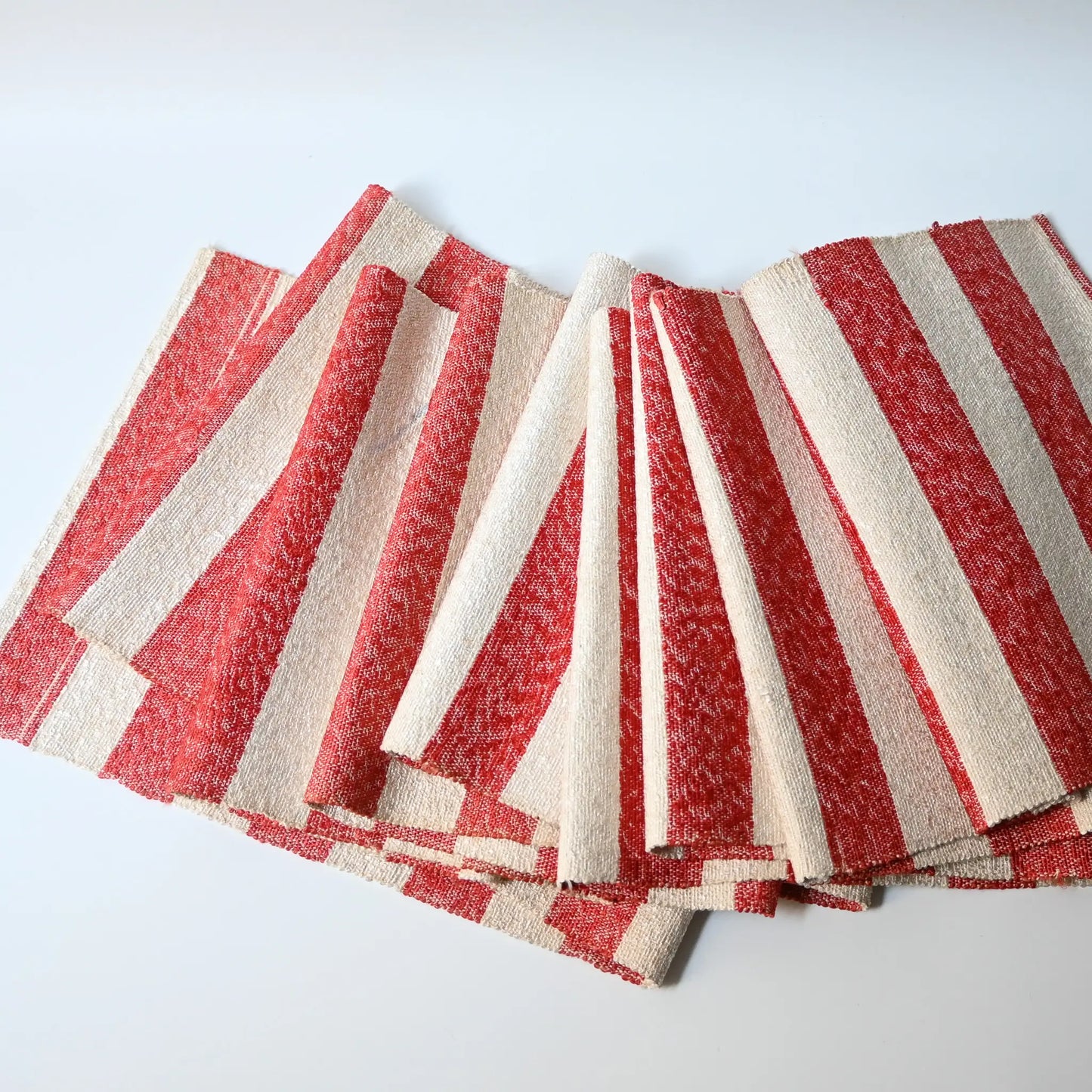 Full view of vintage Japanese Shifu paper yarn red and white stripe obi from the mid-20th century.