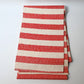Full view of vintage Japanese Shifu paper yarn red and white stripe obi from the mid-20th century.