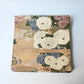 Vintage Japanese women's silk brocade Maru obi with chrysanthemum motif.