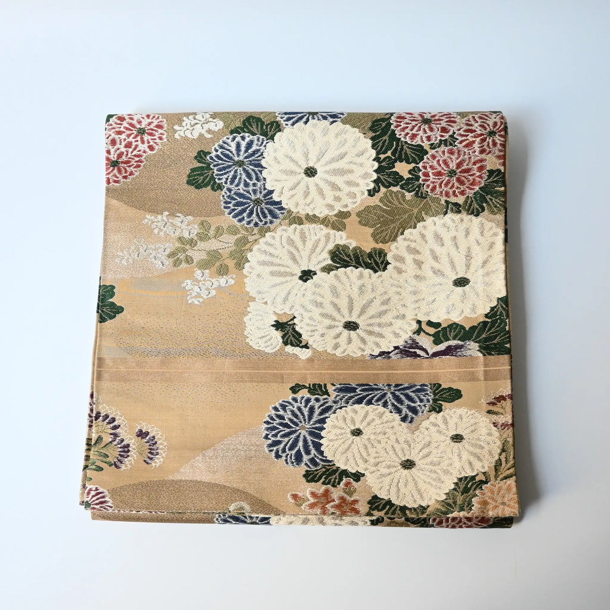 Vintage Japanese women's silk brocade Maru obi with chrysanthemum motif.