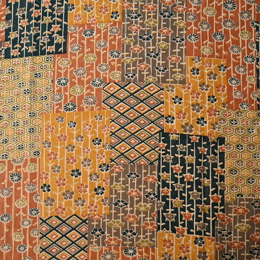 Intricate floral and geometric design in a warm colour palette.