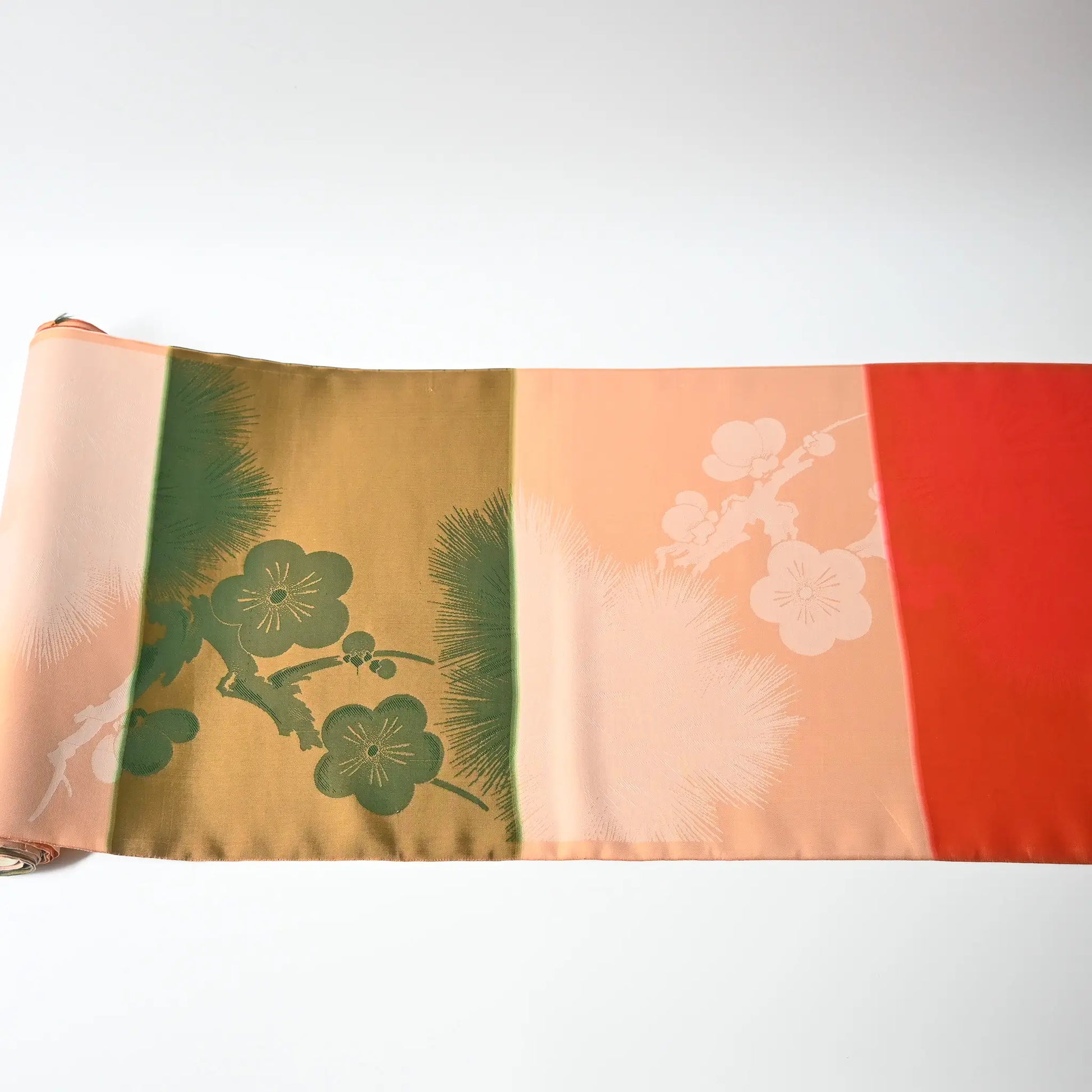 Vintage Japanese silk fabric roll with plum blossom and pine tree, beautiful sheen.