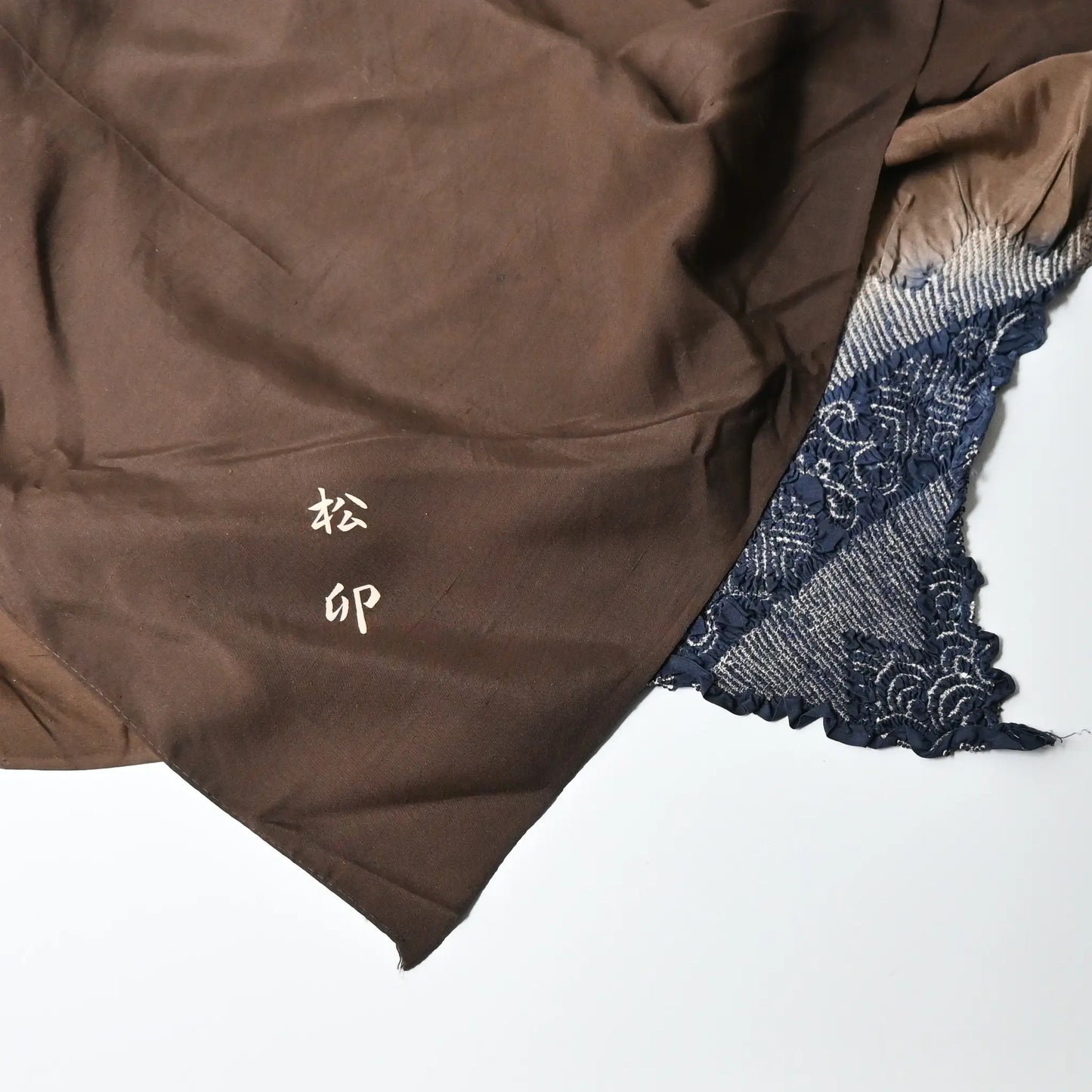 Detailed view of vintage Japanese silk furoshiki with a hand-dyed shibori in brown.