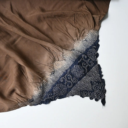 Detailed view of vintage Japanese silk furoshiki with a hand-dyed shibori in brown.