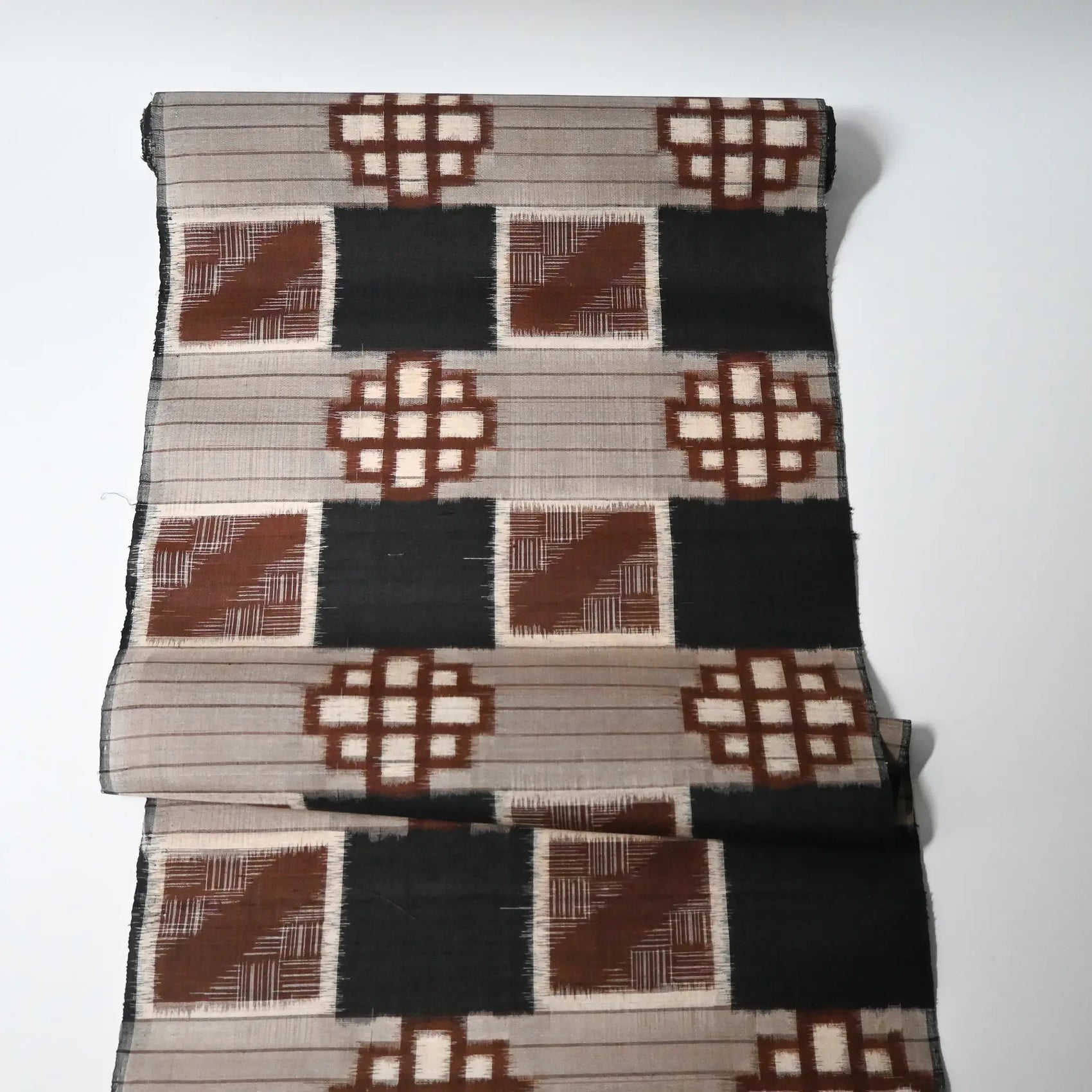Full view of vintage Japanese silk kimono fabric with bold geometric pattern from the mid-20th century.