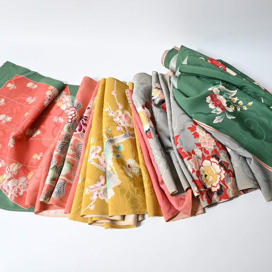 Drapes of vintage  kimono sample roll Somemihon, showcasing different designs and colours.