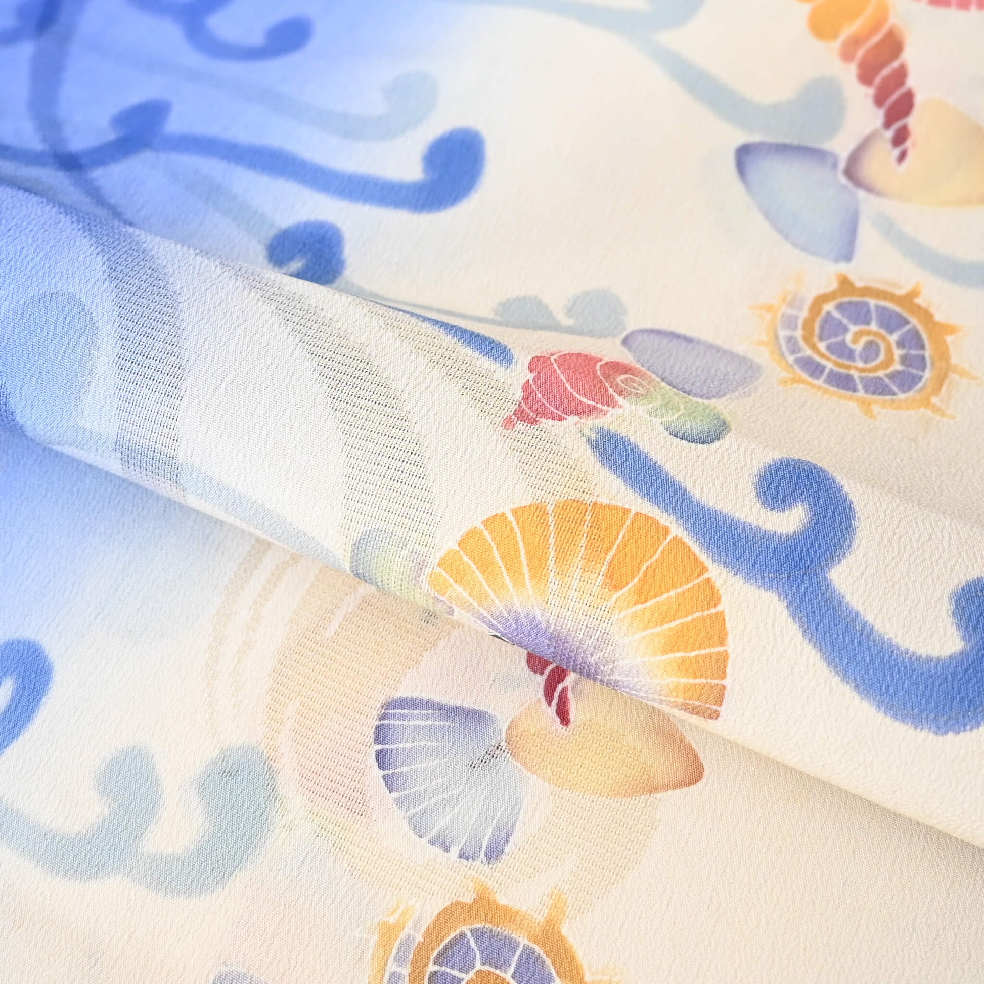 Close-up view of vintage Japanese summer kimono silk, intricate weave.