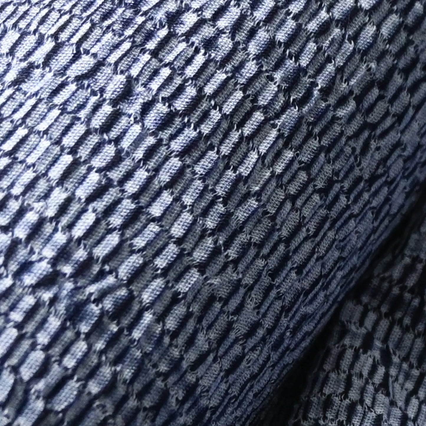 Close up view of vintage Taiten shibori cotton, hand dyed.