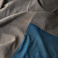 Detail of naturally dyed brown cotton and indigo section on vintage Japanese futon cover
