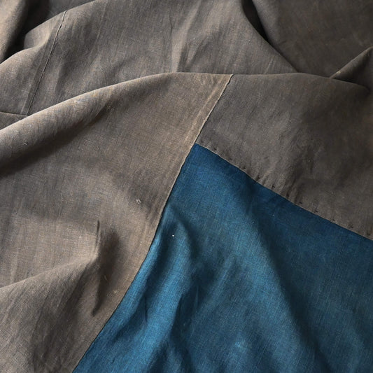 Detail of naturally dyed brown cotton and indigo section on vintage Japanese futon cover
