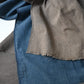 Detail of naturally dyed brown cotton and indigo section on vintage Japanese futon cover
