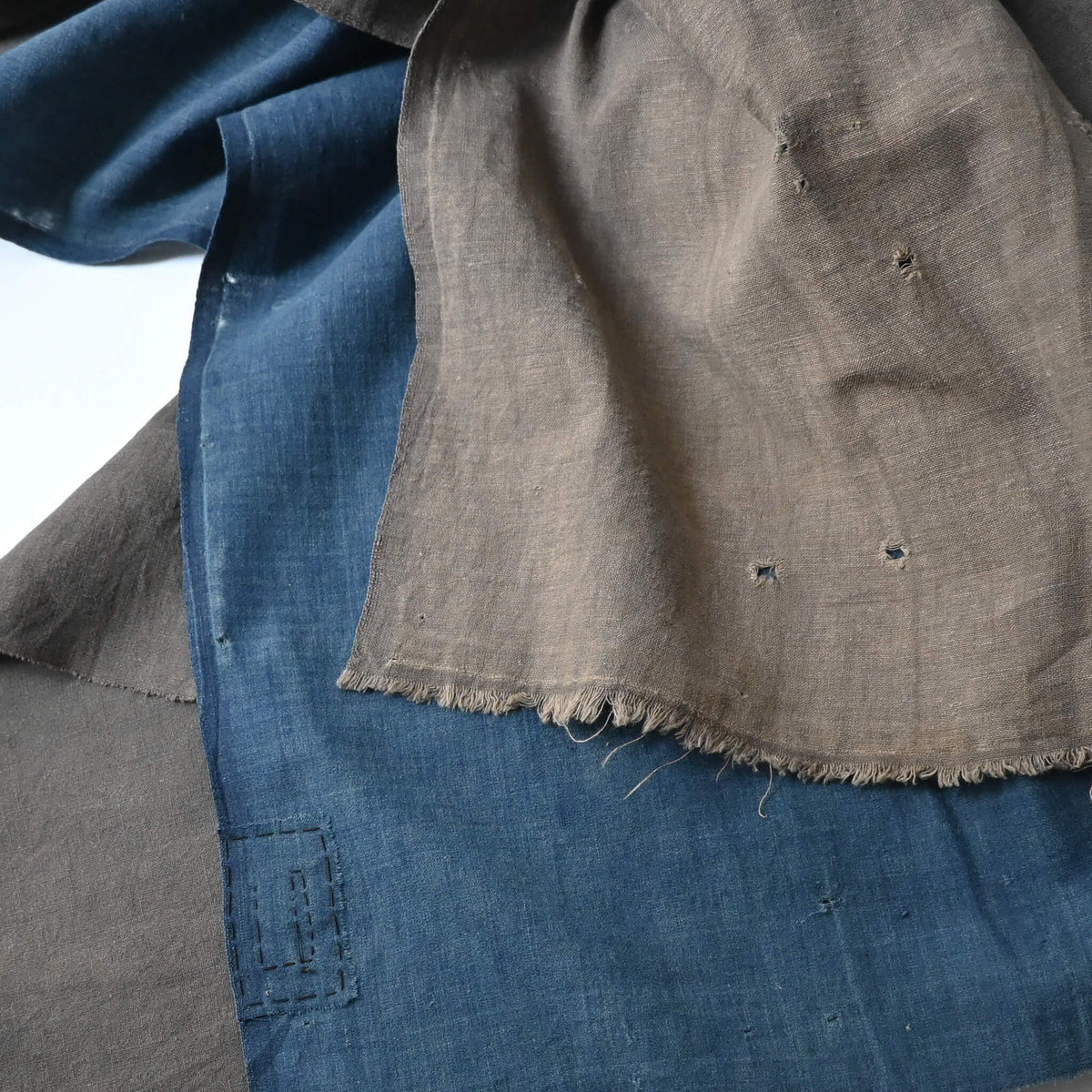 Detail of naturally dyed brown cotton and indigo section on vintage Japanese futon cover
