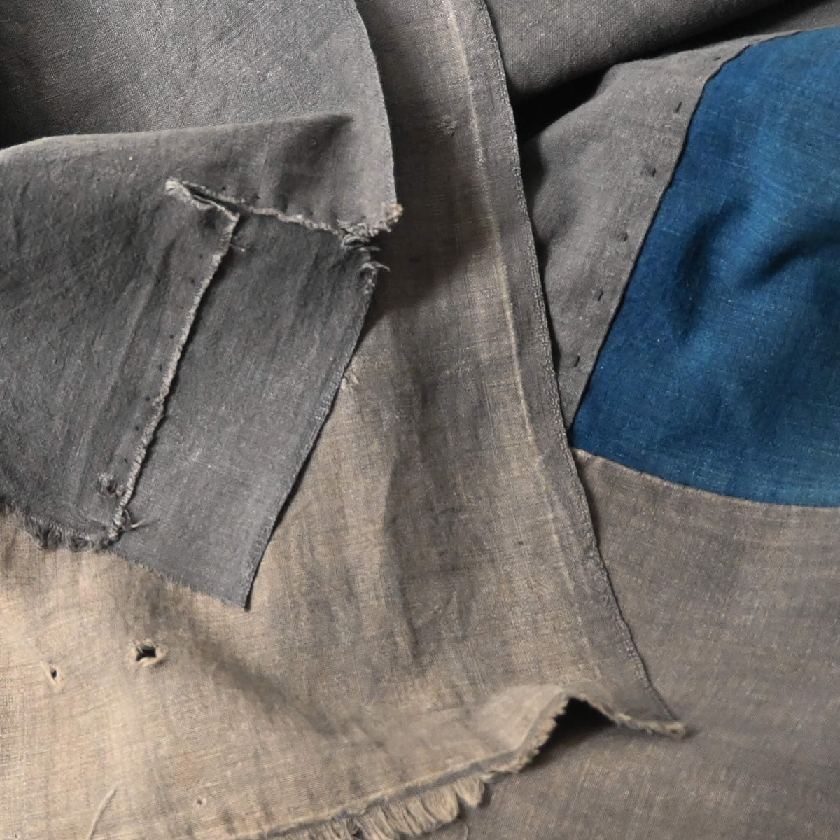 Detail of naturally dyed brown cotton and indigo section on vintage Japanese futon cover
