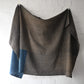 Full view of vintage three-panel naturally dyed brown and indigo cotton futon cover