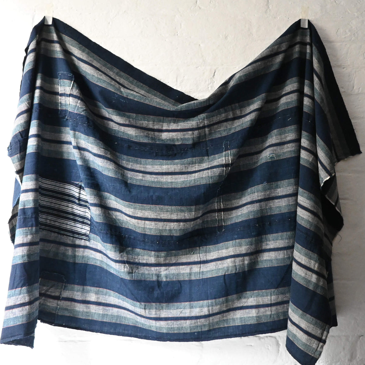 Vintage Japanese indigo stripe futon cover with old mends and patches, suitable for boro and patchwork projects