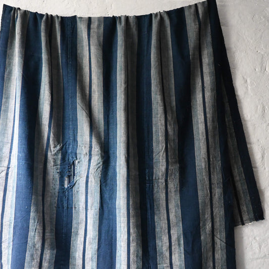 Vintage Japanese indigo stripe futon cover with old mends and patches, suitable for boro and patchwork projects