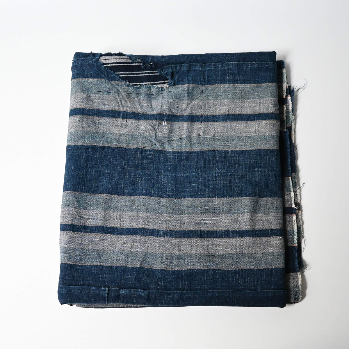 Vintage Japanese indigo stripe futon cover with old mends and patches, suitable for boro and patchwork projects