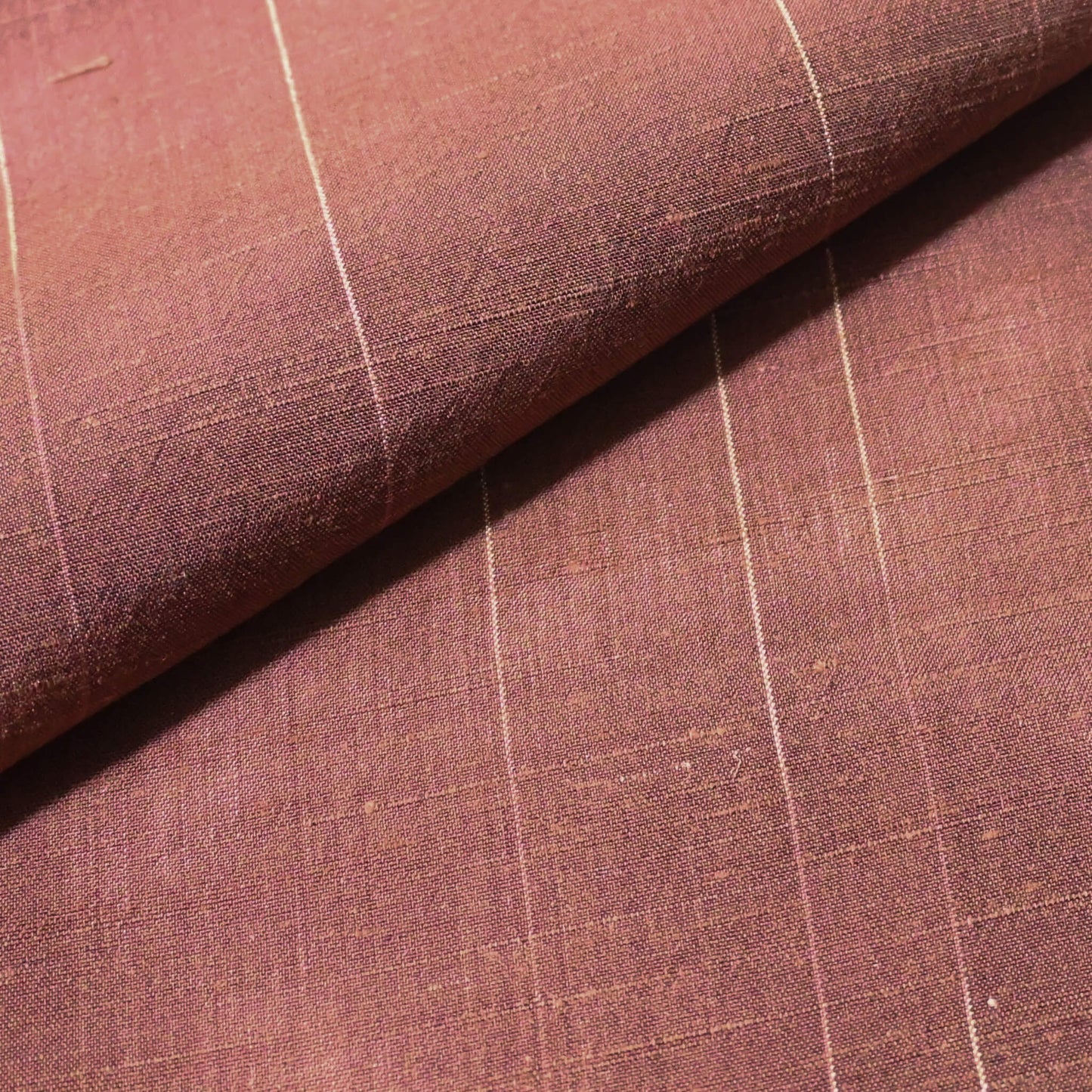 Showcasing a beautifully textured surface with characteristic tsumugi slubs.