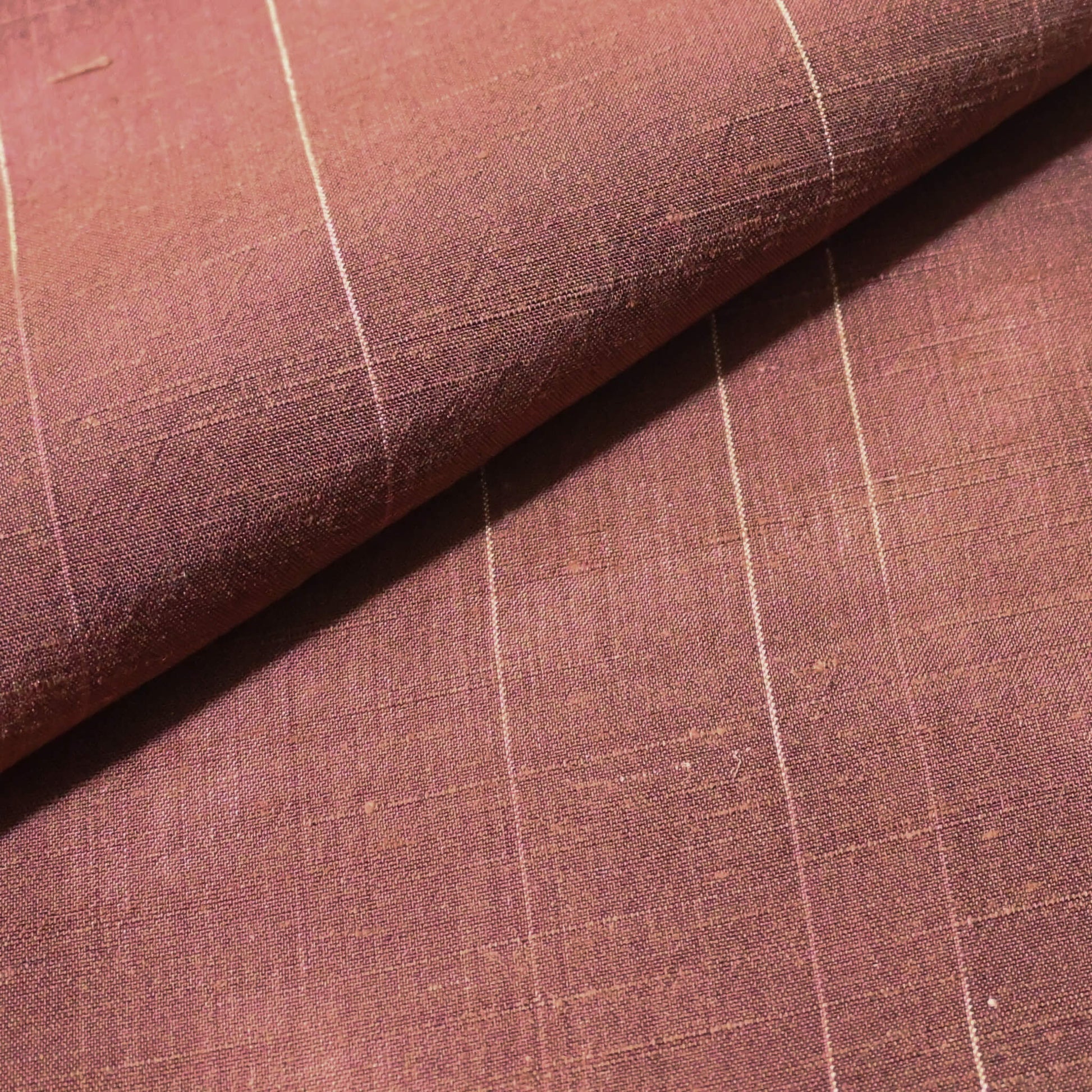 Showcasing a beautifully textured surface with characteristic tsumugi slubs.
