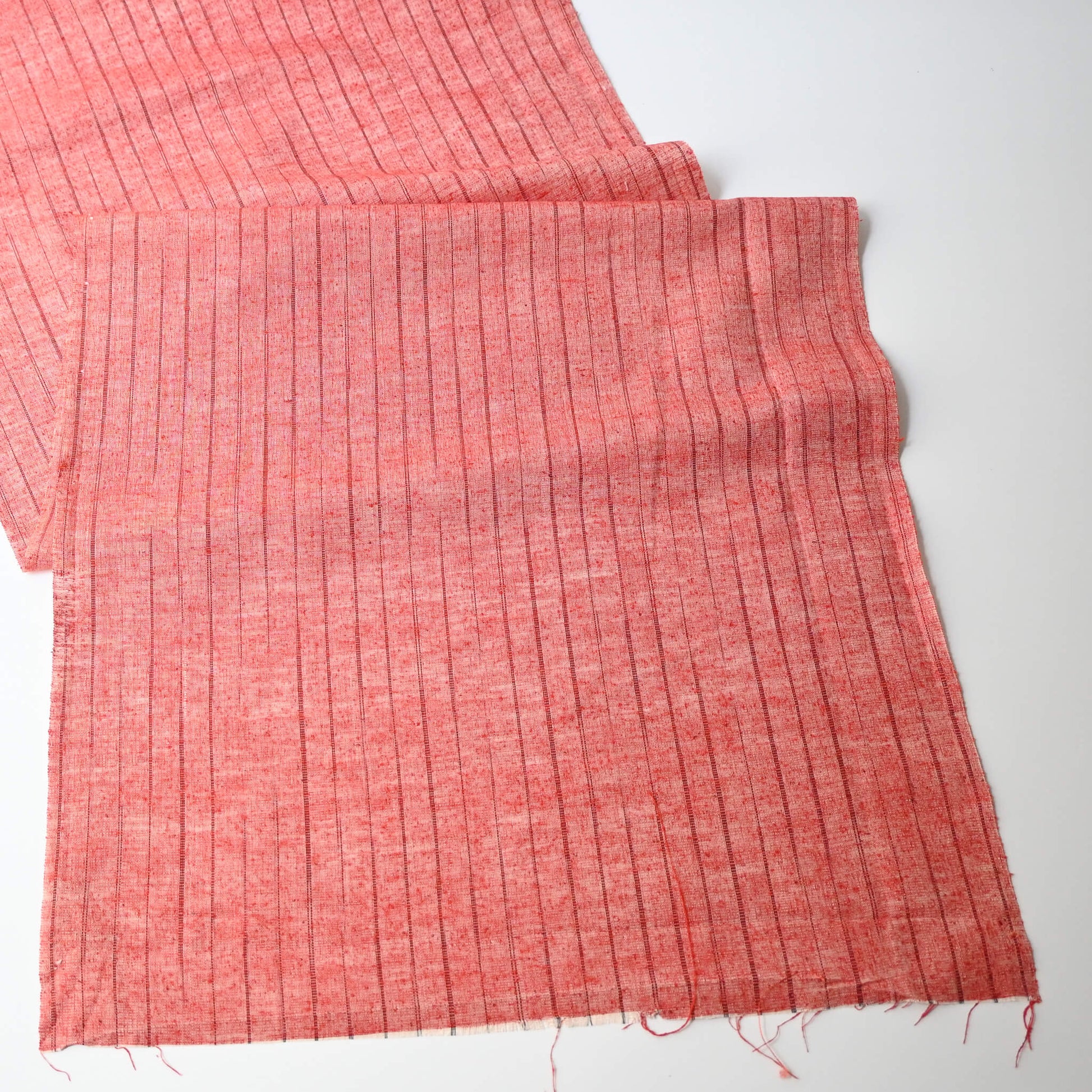 Wider view of vintage tusmugi silk kimono fabric with stripe pattern.