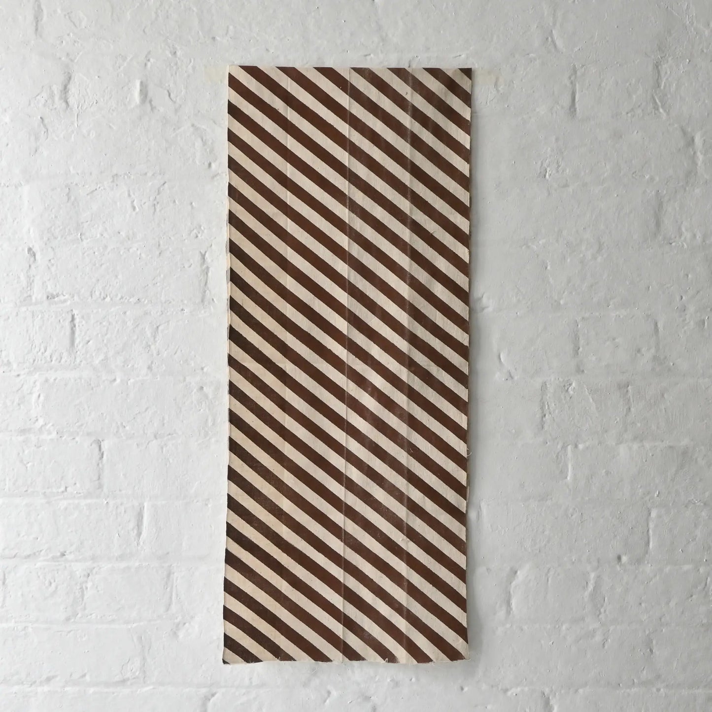 Full view of vintage Japanese white and brown diagonal stripe cotton.